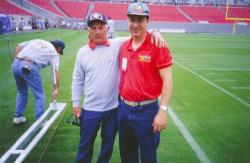 Superbowl XXXV, Tampa Stadium in Tampa, FL.  George Toma, agronomist for the NFL with John Mascaro on field.