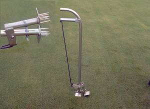 The Turf-Tec ball mark repair tool for lifting up ball marks on golf greens.  This is the simple way to remove ball marks right the first time before the grass is damaged.