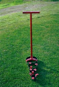 Trim-Clean is for trimming the grass around sprinkler heads.  Units can be purchased with 5", 6", 7" and 8" diameter blades.