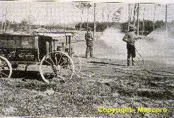  Wooden tank sprayer used on golf greens for insect and worm eradication.