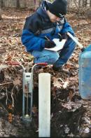 The Turf-Tec Infiltrometer being used in forestry conservation.