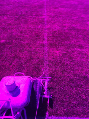 Instead of pulling a string, use the Turf Stress Detection Glasses to easily see the paint lines to repaint the athletic Field. This is a view through the Turf Stress Detection Glasses