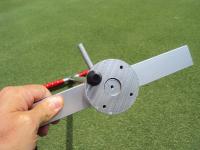 Place cleats in holes provided in the base of the Turf-Tec Shear Strength Tester