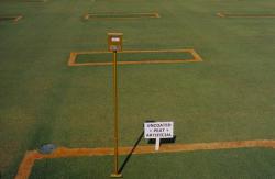 This is the University of Florida Research green in Davie, FL; during the Field Day.  The orange squares are  plots of an experimental coated sand material under development with Lysimeters installed below.  They are also monitoring moisture with a Moisture Sensor.