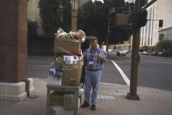 While in downtown Phoenix, I ran into this street person ... not really, it is Tom Curran the STMA auctioneer for the SAFE Foundation taking a load of things over to the convention center for the silent auction.