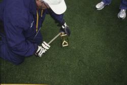 This is George Toma testing the sod for SuperBowl XXXIX at Alltel Stadium, Jacksonville, Florida with the new Turf-Tec - Toma Shear Tester.